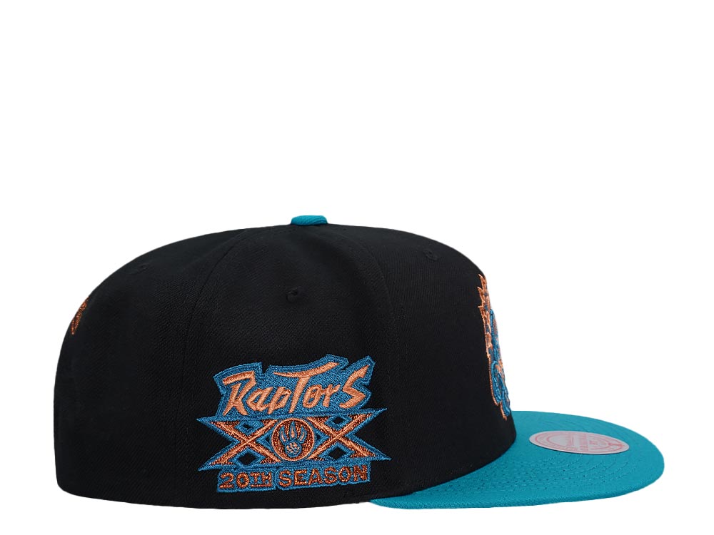 Mitchell & Ness Toronto Raptors 20th Anniversary Make Cents Black Two Tone Hardwood Classic Snapback Gorra